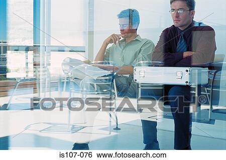 Businessmen behind glass pane View Large Photo Image Stock Photograph - Businessmen behind glass pane. Fotosearch