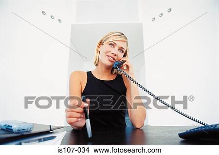 Businesswoman on telephone View Large Photo Image Picture - Businesswoman on telephone. Fotosearch