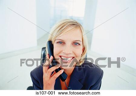 Businesswoman on telephone View Large Photo Image Stock Image - Businesswoman on telephone. Fotosearch