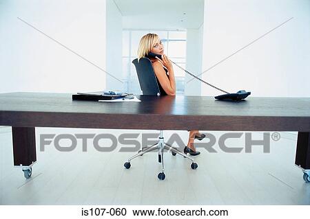 Businesswoman on telephone View Large Photo Image Stock Image - Businesswoman on telephone. Fotosearch
