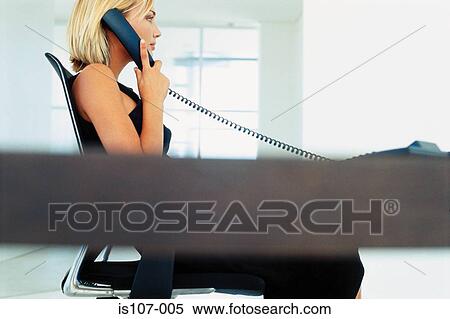 Businesswoman on telephone View Large Photo Image Stock Photography - Businesswoman on telephone. Fotosearch