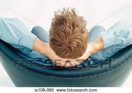 Businessman in office chair View Large Photo Image Stock Photography - Businessman in office chair. Fotosearch