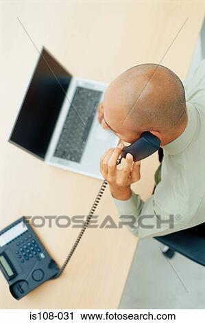 Businessman on telephone View Large Photo Image Stock Image - Businessman on telephone. Fotosearch