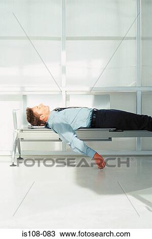 Stock Image - Businessman relaxing. Fotosearch