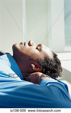 Businessman relaxing View Large Photo Image Stock Photo - Businessman relaxing. Fotosearch