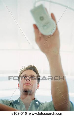 Stock Photography - Businessman with computer mouse. Fotosearch