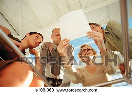 Businesspeople in office View Large Photo Image Stock Image - Businesspeople in office. Fotosearch