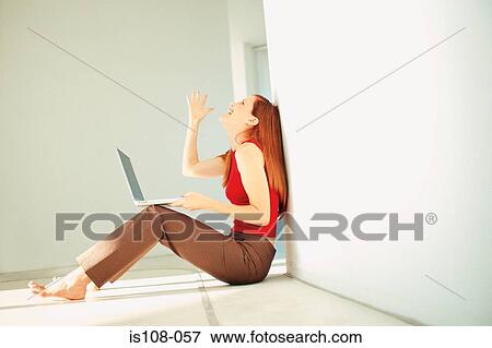 Stock Photo - Overjoyed businesswoman. Fotosearch