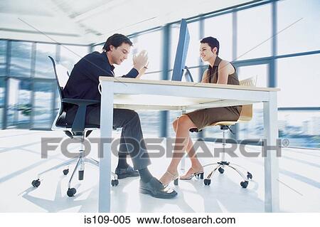 Businessman and businesswoman in meeting View Large Photo Image Stock Photography - Businessman and businesswoman in meeting. Fotosearch