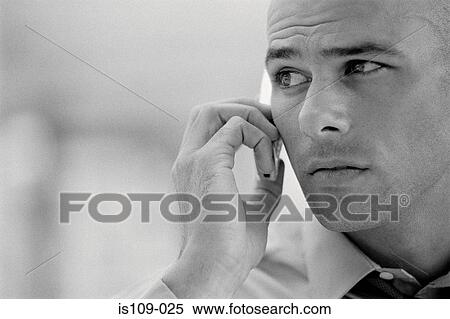 Businessman with cellphone View Large Photo Image Stock Photography - Businessman with cellphone. Fotosearch