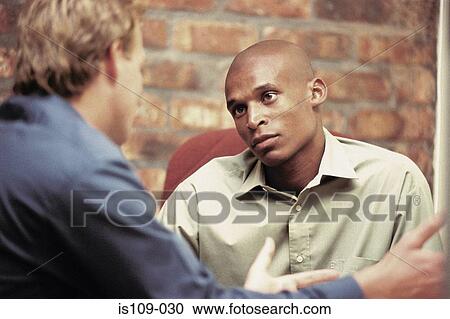 Businessmen in discussion View Large Photo Image Stock Image - Businessmen in discussion. Fotosearch