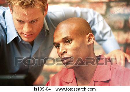Businessmen working on computer View Large Photo Image Stock Image - Businessmen working on computer. Fotosearch