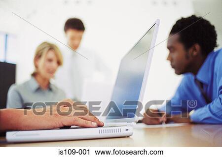 Businesspeople in meeting View Large Photo Image Stock Image - Businesspeople in meeting. Fotosearch