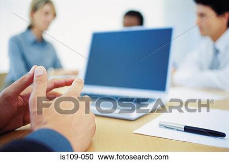 Businesspeople in meeting View Large Photo Image Stock Image - Businesspeople in meeting. Fotosearch
