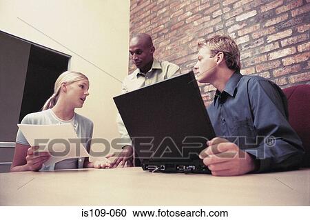 Businesspeople in meeting View Large Photo Image Stock Image - Businesspeople in meeting. Fotosearch