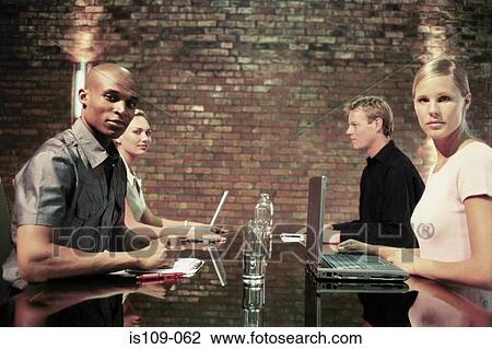 Businesspeople in meeting View Large Photo Image Stock Image - Businesspeople in meeting. Fotosearch