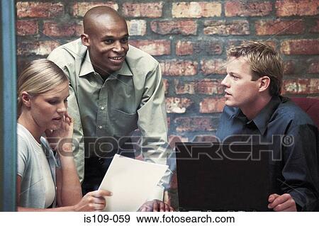 Businesspeople in meeting View Large Photo Image Stock Photo - Businesspeople in meeting. Fotosearch