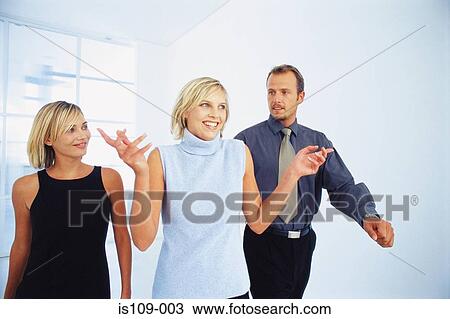 Businesspeople in office View Large Photo Image Stock Image - Businesspeople in office. Fotosearch