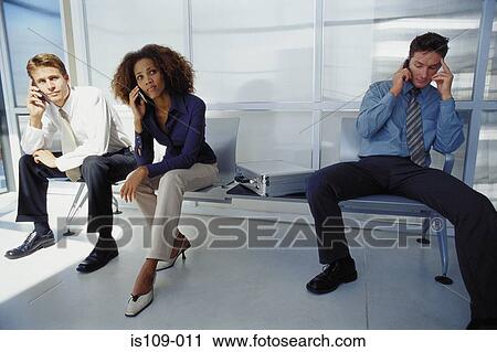 Businesspeople with cellphones View Large Photo Image Stock Image - Businesspeople with cellphones. Fotosearch