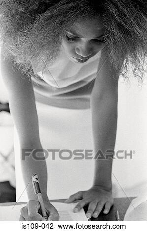 Businesswoman signing paperwork View Large Photo Image Stock Image - Businesswoman signing paperwork. Fotosearch