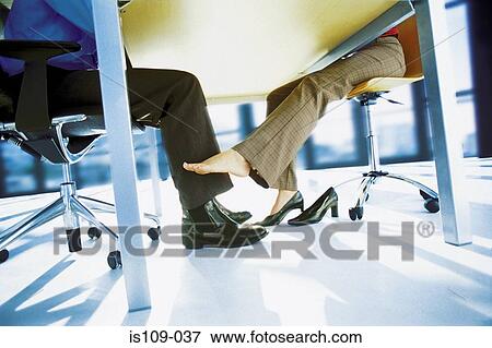 Businesswoman touching up businessman View Large Photo Image Stock Photo - Businesswoman touching up businessman. Fotosearch
