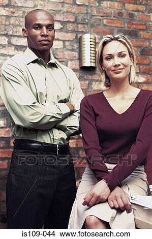 Portrait of businessman and businesswoman View Large Photo Image Picture - Portrait of businessman and businesswoman. Fotosearch