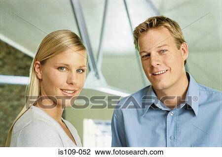 Portrait of businessman and businesswoman View Large Photo Image Stock Image - Portrait of businessman and businesswoman. Fotosearch