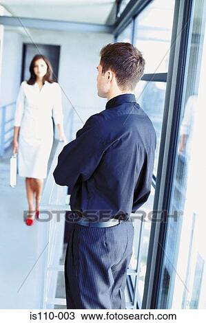 Man and woman in office View Large Photo Image Stock Image - Man and woman in office. Fotosearch