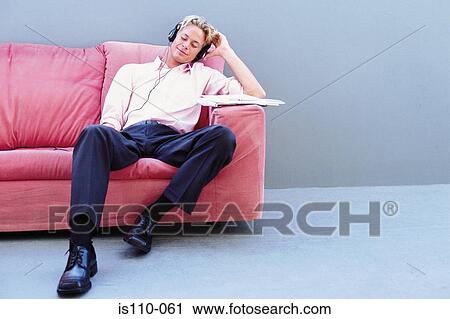 Man listening to music View Large Photo Image Stock Image - Man listening to music. Fotosearch