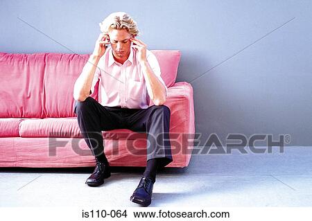 Picture - Man talking on cellphone. Fotosearch
