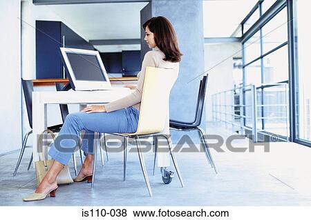 Woman working from home View Large Photo Image Stock Photo - Woman working from home. Fotosearch