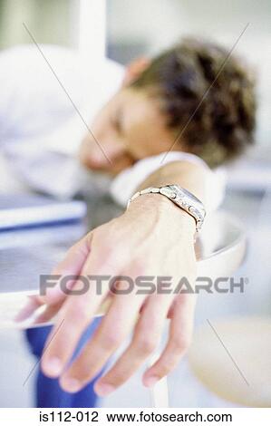 Man asleep on table View Large Photo Image Stock Image - Man asleep on table. Fotosearch