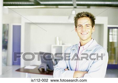 Stock Image - Man in an office. Fotosearch
