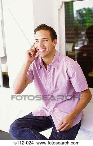 Picture - Man talking on cellphone. Fotosearch