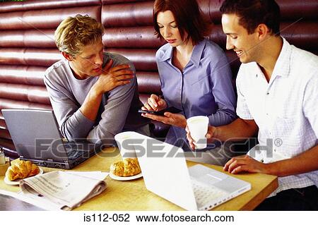Men and woman discussing work at bar View Large Photo Image Stock Image - Men and woman discussing work at bar. Fotosearch