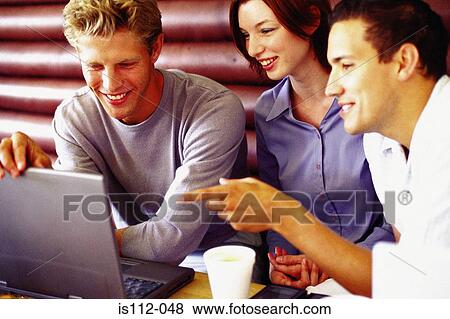 Men and woman discussing work at bar View Large Photo Image Stock Photo - Men and woman discussing work at bar. Fotosearch