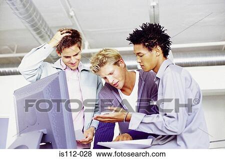 Men in an office View Large Photo Image Stock Photo - Men in an office. Fotosearch