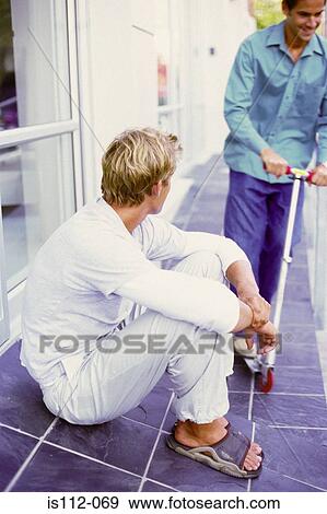 Men outside an office View Large Photo Image Stock Photo - Men outside an office. Fotosearch