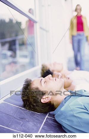 Men relaxing outside View Large Photo Image Stock Image - Men relaxing outside. Fotosearch