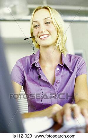 Woman using laptop computer View Large Photo Image Stock Photo - Woman using laptop computer. Fotosearch