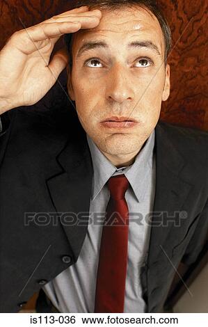 Businessman looking upwards View Large Photo Image Stock Photograph - Businessman looking upwards. Fotosearch