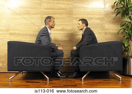 Businessmen meeting View Large Photo Image Stock Photograph - Businessmen meeting . Fotosearch