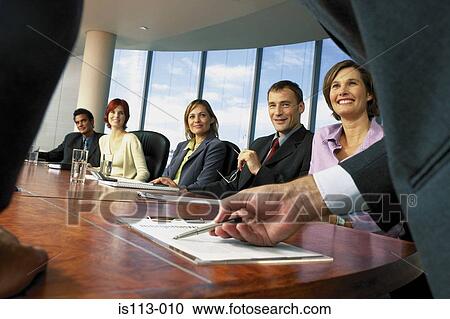 Businesspeople in boardroom View Large Photo Image Stock Image - Businesspeople in boardroom. Fotosearch