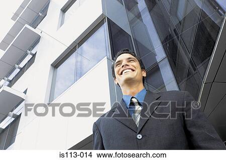 Picture - Happy businessman. Fotosearch