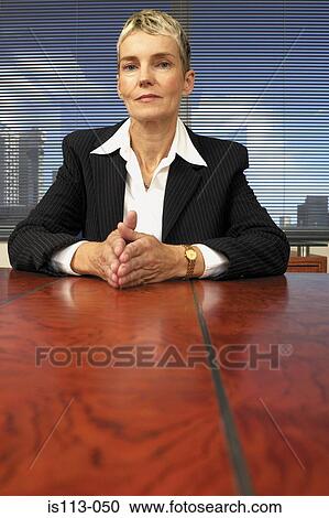 Stock Image - Portrait of businesswoman . Fotosearch