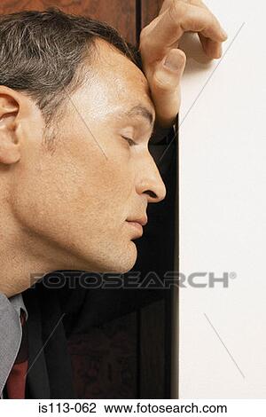Tired businessman View Large Photo Image Stock Image - Tired businessman. Fotosearch