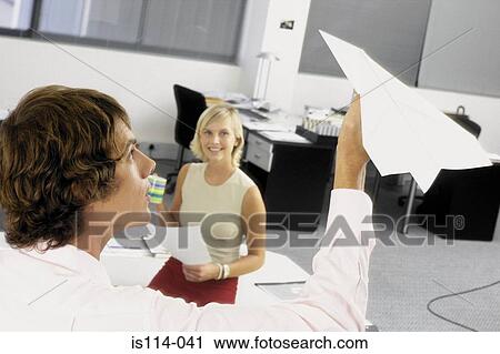Businessman and businesswoman in office View Large Photo Image Stock Image - Businessman and businesswoman in office. Fotosearch