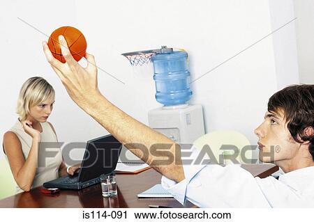 Businessman and businesswoman in office View Large Photo Image Stock Image - Businessman and businesswoman in office. Fotosearch
