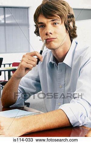 Businessman in office View Large Photo Image Stock Image - Businessman in office. Fotosearch