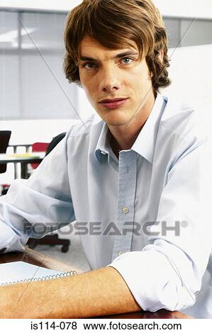 Stock Photo - Businessman in office. Fotosearch